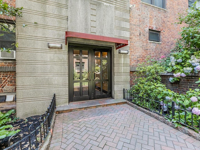 entrance to property featuring french doors