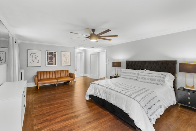 bedroom featuring dark hardwood / wood-style flooring, radiator heating unit, ornamental molding, and ceiling fan