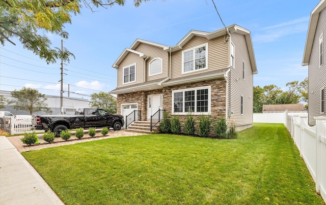 view of front of property featuring a front lawn