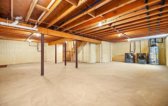 basement with separate washer and dryer and gas water heater