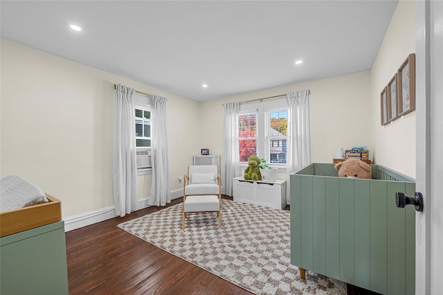 sitting room featuring dark hardwood / wood-style floors