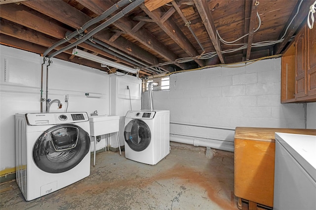 washroom with washer and clothes dryer