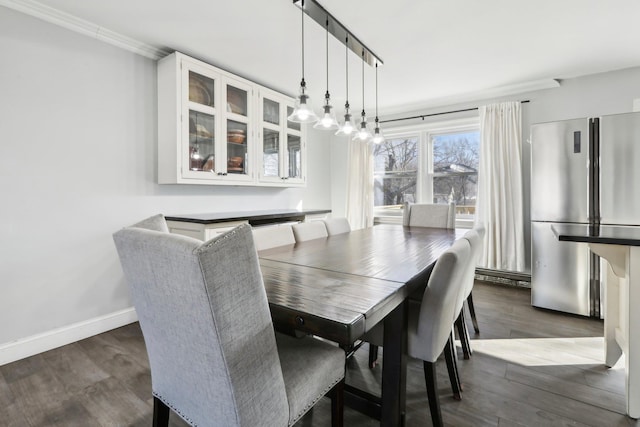 dining area with dark wood-type flooring