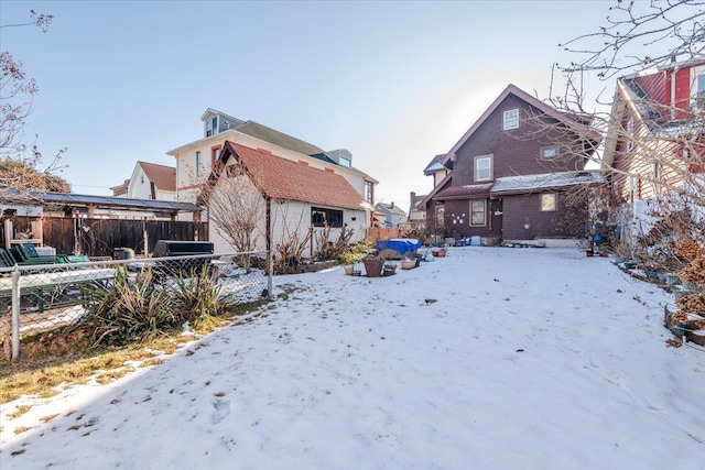 view of yard layered in snow