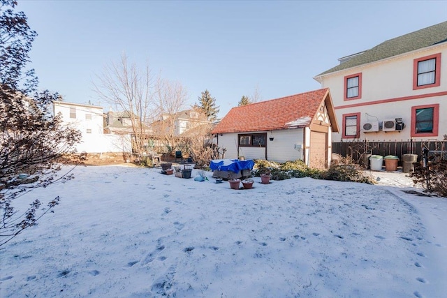 view of yard layered in snow