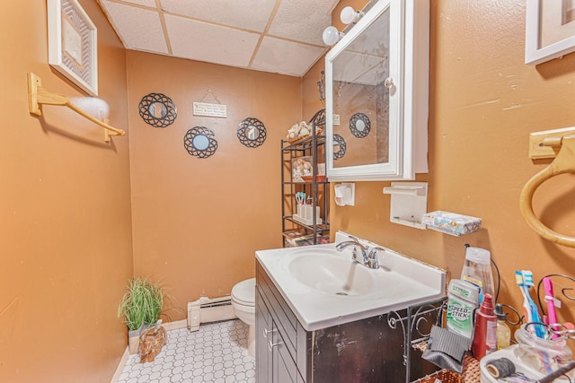 20 E Pine St, Long Beach, NY 11561 - bathroom featuring a drop ceiling, vanity, and baseboard heating