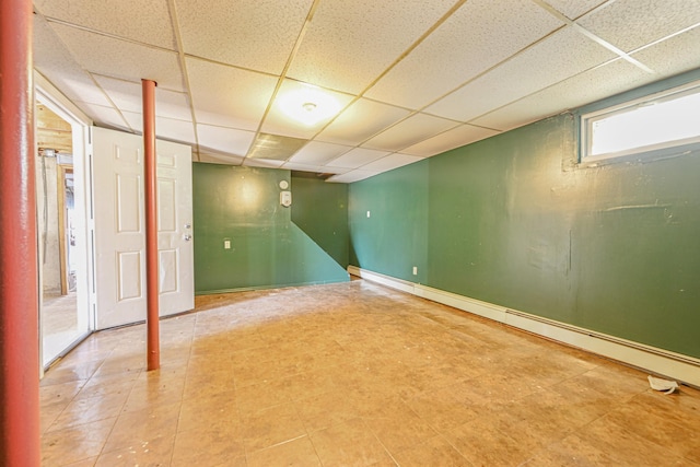 20 E Pine St, Long Beach, NY 11561 - basement with a paneled ceiling and a baseboard heating unit