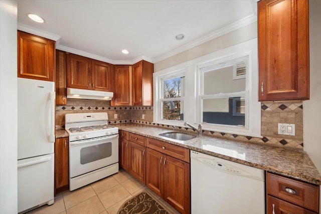 kitchen with stone counters, sink, ornamental molding, light tile patterned floors, and white appliances