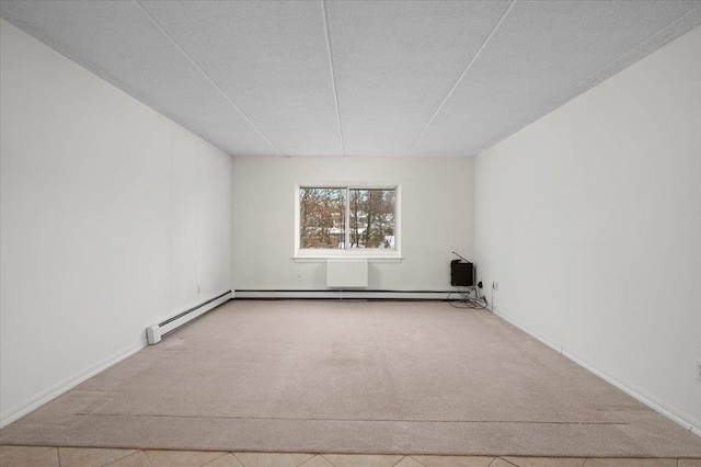 unfurnished room featuring light colored carpet