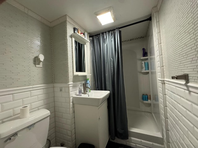 bathroom with vanity, a shower with curtain, and toilet