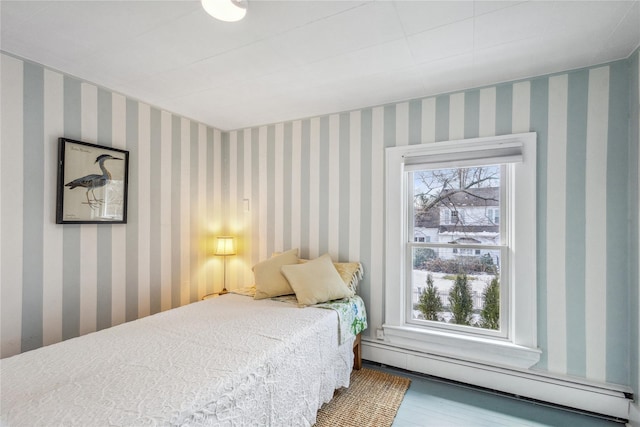 bedroom featuring a baseboard radiator