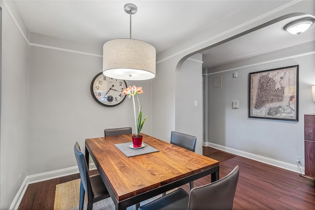 dining room featuring dark hardwood / wood-style flooring