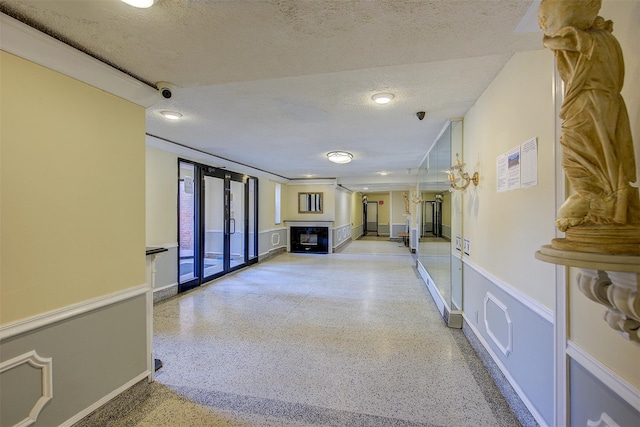 interior space with a textured ceiling