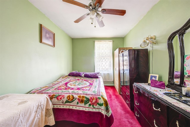 bedroom featuring light colored carpet and ceiling fan