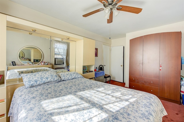 bedroom featuring cooling unit, ceiling fan, and carpet flooring