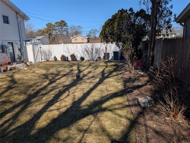 view of yard featuring a fenced backyard