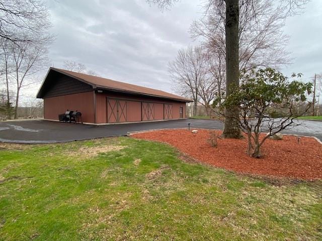 176 Gardnerville Rd, New Hampton, NY 10958 - view of side of home featuring a yard and an outbuilding