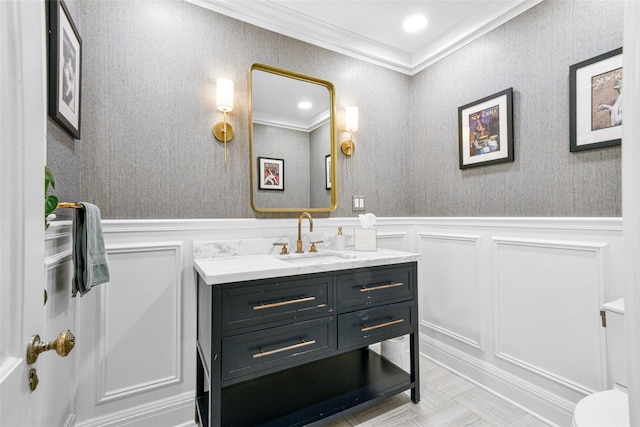 bathroom with vanity and crown molding