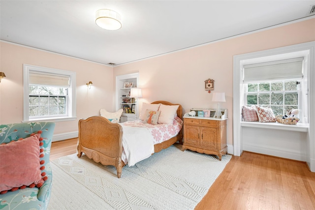 bedroom featuring light hardwood / wood-style flooring