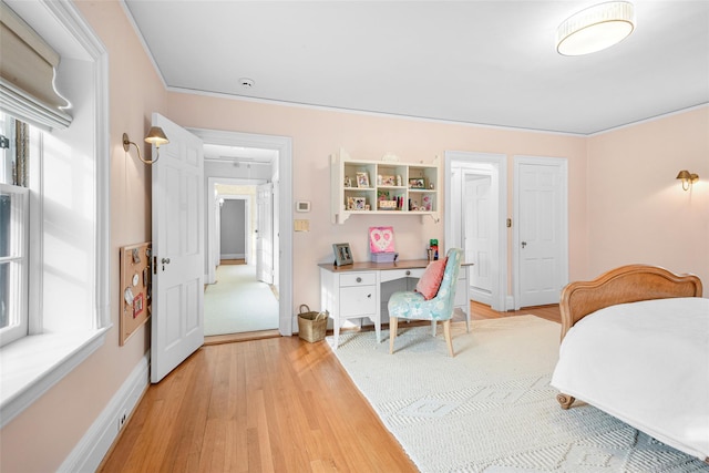 bedroom featuring light wood-type flooring