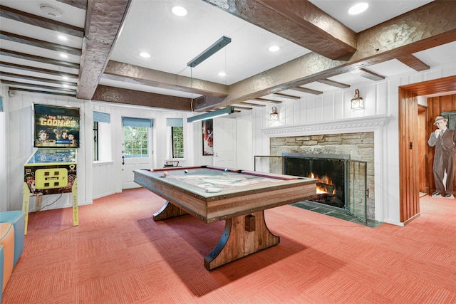 playroom with beam ceiling, pool table, a stone fireplace, and carpet floors