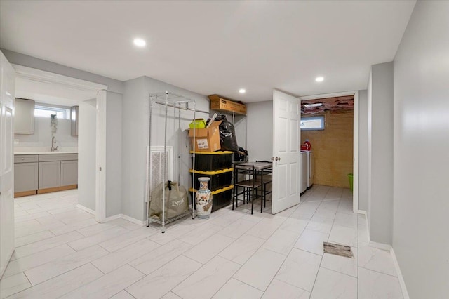 interior space with washer / dryer and sink