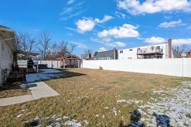 snowy yard featuring a gazebo