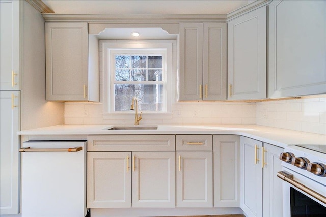 kitchen featuring white appliances, sink, and decorative backsplash