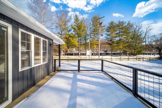 view of snow covered deck