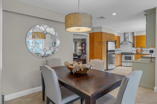 dining room with light tile patterned flooring