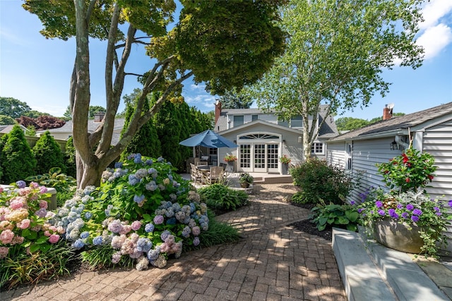 exterior space featuring a patio and french doors