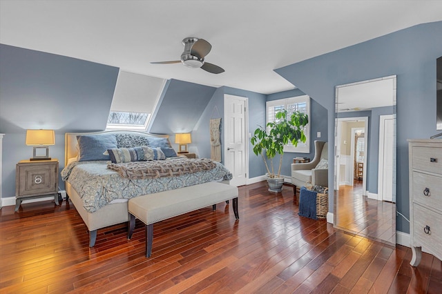 bedroom featuring lofted ceiling, hardwood / wood-style floors, and ceiling fan