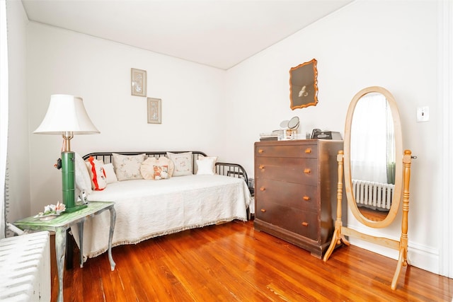 bedroom featuring hardwood / wood-style flooring