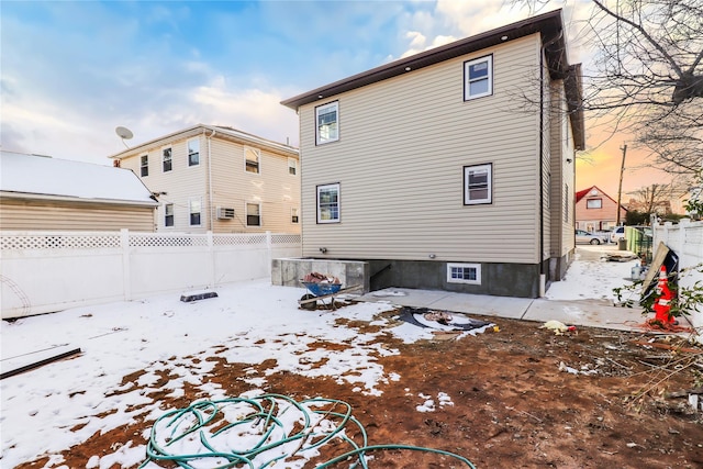 view of snow covered house