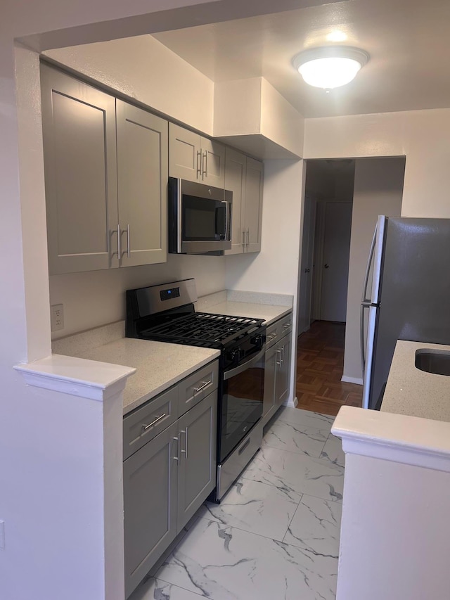 250 N Broadway Unit 3D, Yonkers, NY 10701 - kitchen with stainless steel appliances and gray cabinetry