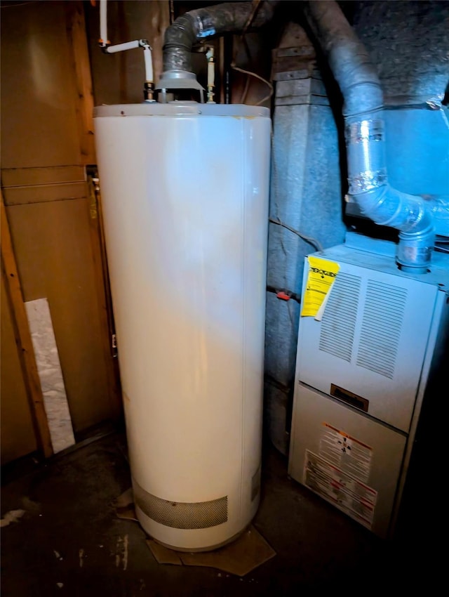 utility room with water heater and heating unit