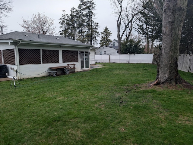 view of yard with fence
