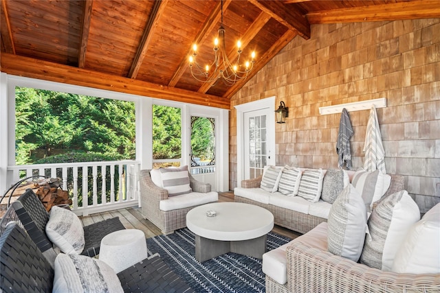 interior space with an inviting chandelier, vaulted ceiling with beams, and wood ceiling