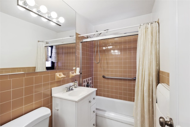 full bathroom featuring vanity, tile walls, shower / bathtub combination with curtain, and toilet