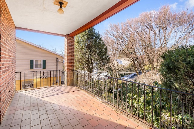 view of patio / terrace featuring a balcony