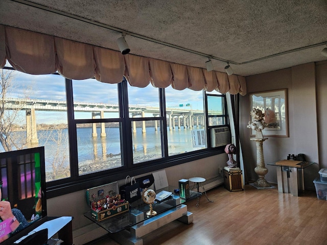 sunroom featuring cooling unit