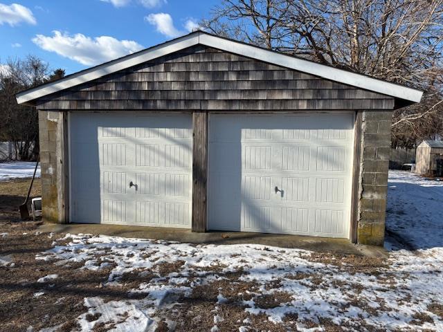 view of snow covered garage