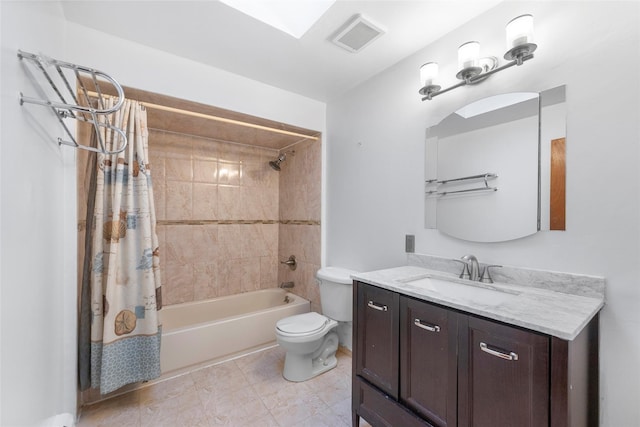 full bathroom with vanity, shower / bath combination with curtain, and toilet