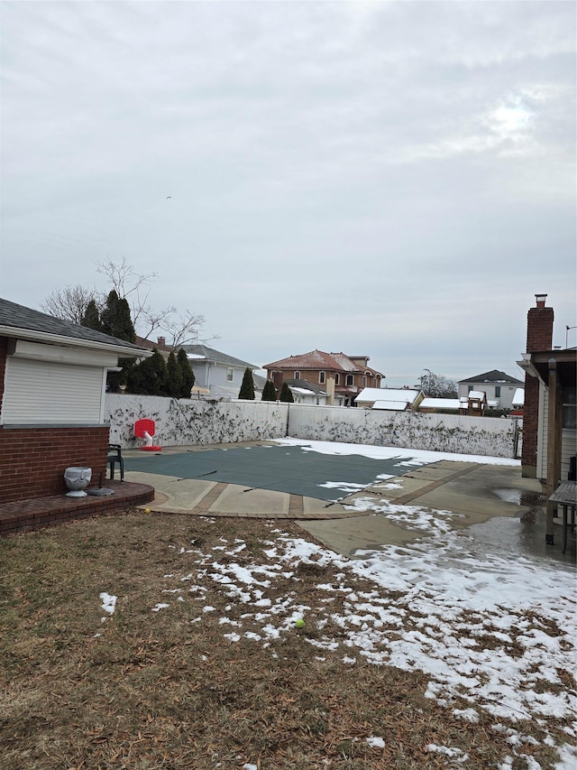 view of yard covered in snow