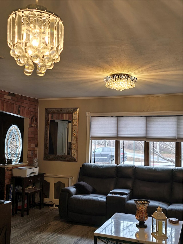 living room with hardwood / wood-style flooring and a chandelier