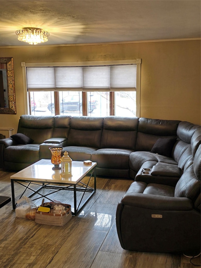 15731 80th St, Howard Beach, NY 11414 - living room featuring crown molding, a wealth of natural light, and wood finished floors