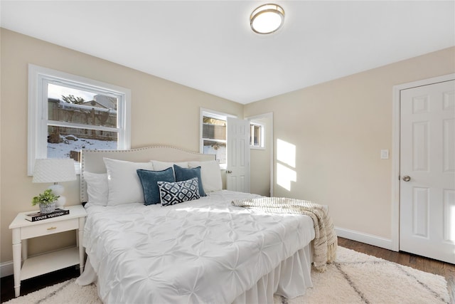 bedroom featuring wood-type flooring