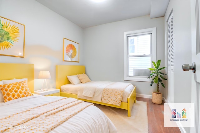 bedroom with light hardwood / wood-style flooring