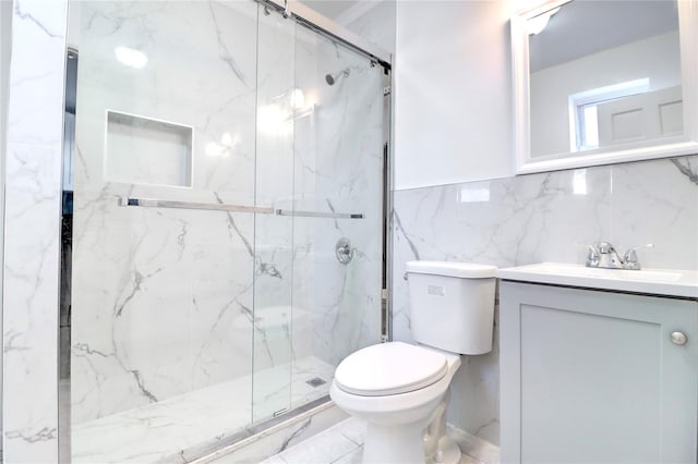 bathroom with tile walls, an enclosed shower, vanity, decorative backsplash, and toilet