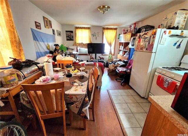 dining area featuring light wood-type flooring